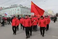 Участники движения «Суть времени» на акции «Марш братства и гражданского сопротивления» во время шествия под лозунгами 