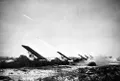 Батарея гвардейских реактивных миномётов БМ-13Н «Катюша» наносит удар по позициям противника. Март–апрель 1945