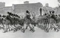 Члены детской фашистской организации проходят строем перед Бенито Муссолини. Рим. 1934