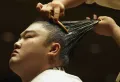 Процесс создания традиционной причёски сумоиста