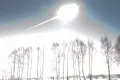 Вспышка в момент вхождения метеорита Челябинск в плотные слои атмосферы. 15 февраля 2013, 9 ч 20 мин 33 с по местному времени (UTC+6)