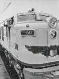 Чарлз Уилсон, президент General Electric, и Роберт МакКолл, президент American Locomotive Company, в кабине первого американского газотурбовоза Union Pacific 50. 1949