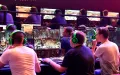 Посетители ярмарки Gamescom играют в «Total War: Arena». Кёльн. 2017