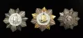 Орден Кутузова 1-й (в центре), 2-й (слева) и 3-й степени