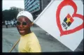 Сторонник Жозе Эдуарду душ Сантуша с флагом МПЛА. Ангола. 1992
