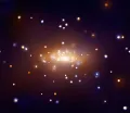 Изображение галактики Сомбреро в рентгеновских лучах, на котором видны горячий газ в галактике и точечные источники (некоторые из них относятся к галактике, другие являются объектами фона)
