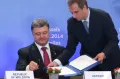 Президент Пётр Порошенко подписывает Соглашение об ассоциации между Украиной и Европейским союзом. Брюссель. 27 июня 2014