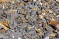 Обломки графитовой руды Ботогольского месторождения (Республика Бурятия, Россия)