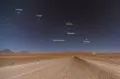 Созвездие Орион и рассеянные звёздные скопления Плеяды и Гиады (в созвездии Телец) на ночном небе над пустыней Атакама (Чили)