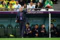 Тренер сборной Бразилии Тите даёт инструкции команде во время матча 1/4 финала Двадцать второго чемпионата мира по футболу против сборной Хорватии. Эр-Райян (Катар). 2022