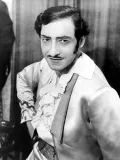 Карл Шмитт-Вальтер в партии Фигаро в опере «Севильский цирюльник» Дж. Россини. 1946.