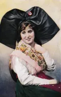 Французы. Девушка из Эльзаса в традиционном головном уборе и костюме