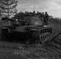 Американский танк M48 (Patton III) с десантом на броне двигается к месту боевых действий. 1965