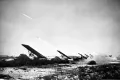 Батарея гвардейских реактивных миномётов БМ-13Н «Катюша» наносит удар по позициям противника. Март–апрель 1945