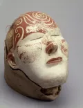 Маска на голове женщины. Таштыкская культура