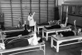 Врач проводит занятие лечебной гимнастикой с пациентами. Научно-исследовательский институт ревматизма АМН СССР. 1977