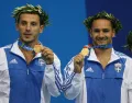 Чемпионы Игр XXVIII Олимпиады по прыжкам в воду Николаос Сиранидис и Томас Бимис. 2004