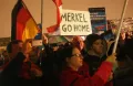 Митинг сторонников политической партии «Альтернатива для Германии», выступающих против либеральной политики канцлера Германии Ангелы Меркель по приему мигрантов и беженцев. Магдебург (Германия). 2015