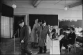 Мужчины голосуют на избирательном участке. Цюрих. 1966