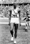 Четырёхкратный чемпион Игр XI Олимпиады Джес­си Оуэнс. 1936