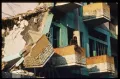 Солдат правительства на балконе повреждённого здания. Менонге (Ангола). 1993