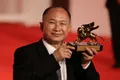 Джон Ву с наградой «Золотой лев» за вклад в мировой кинематограф на Венецианском кинофестивале. 2010